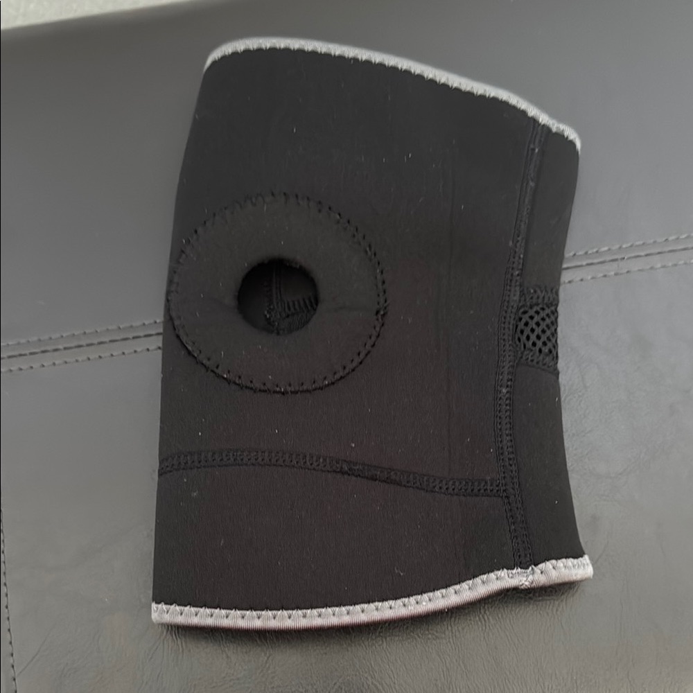 TKO brand Black Knee Brace Support.